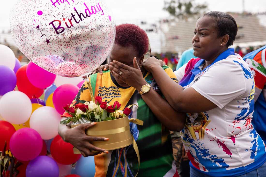 Beka Ntsanwisi (Mama Beka) is gifted a surprise birthday cake on her birthday. She is the organiser of the event.