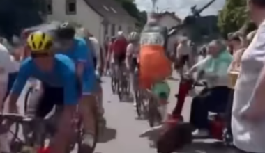 Elderly fan drives mobility scooter into peloton at junior race