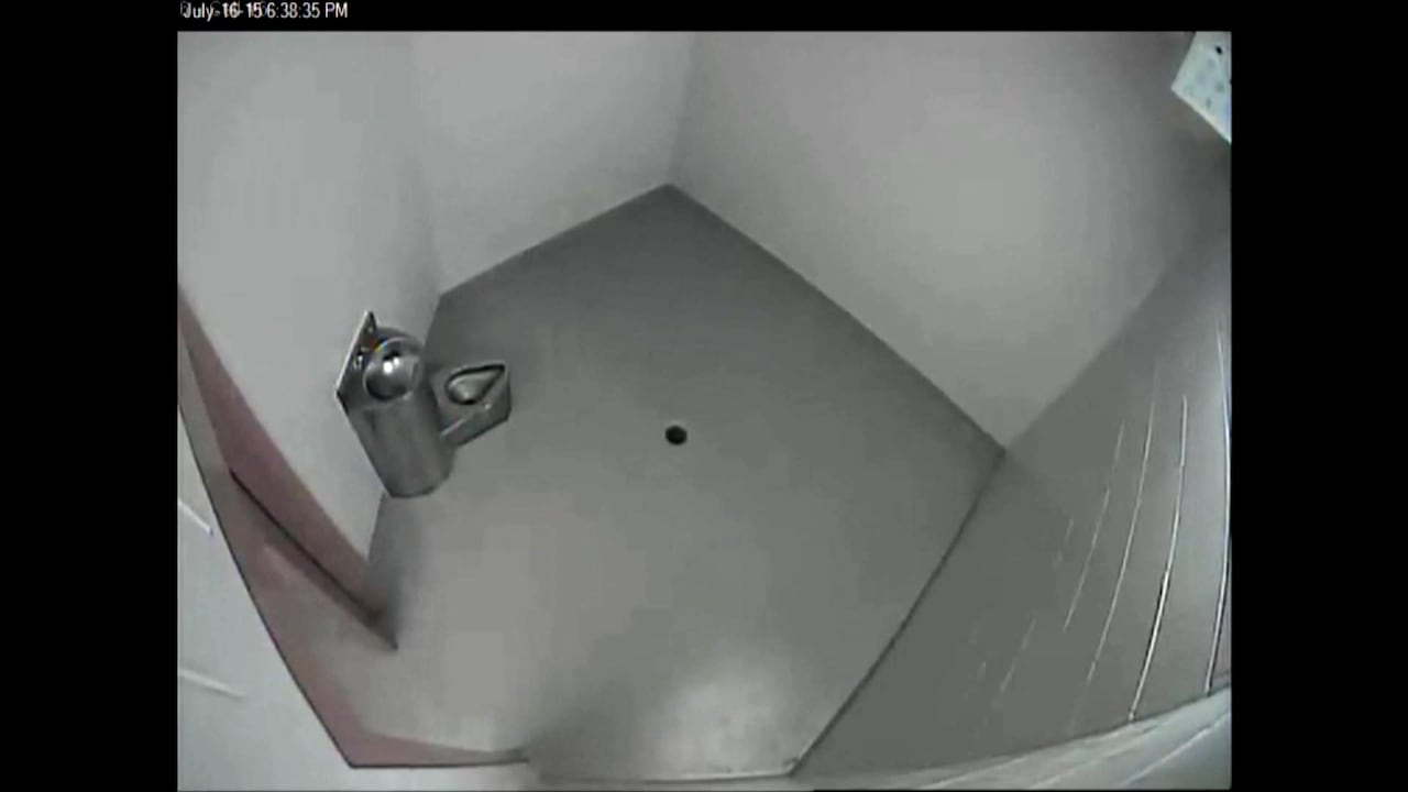 A CCTV image of a holding cell in the RCMP detachment in Airdrie, Alta.