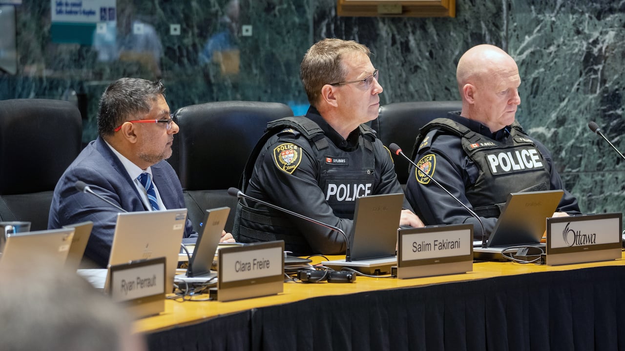 A photo of Salim Fakirani, Eric Stubbs, Steve Bell from the ottawa Police at ottawa city council.