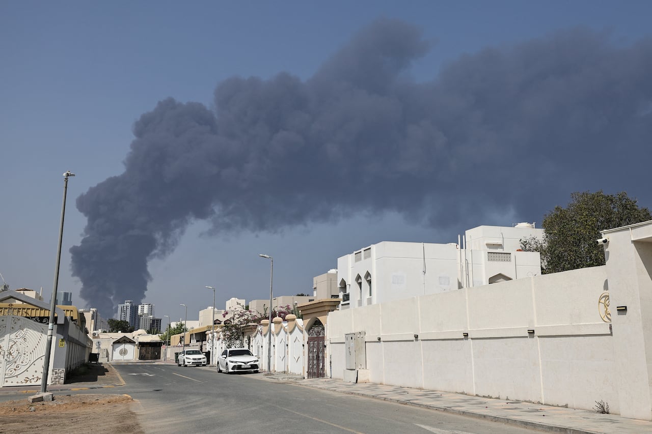 Smoke rises from the direction of an energy installation in the UAE