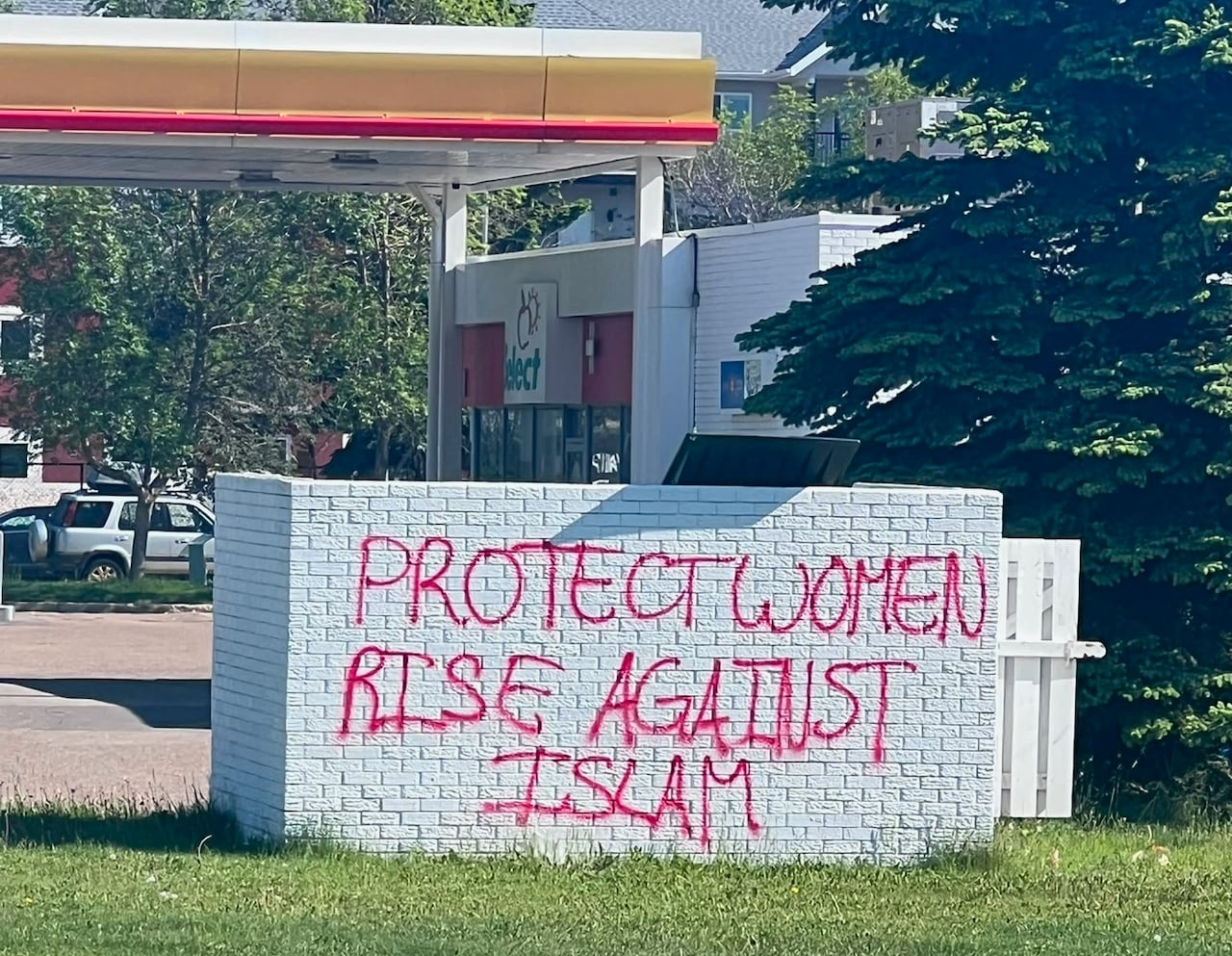A block reading Protect Women Rise Against Islam