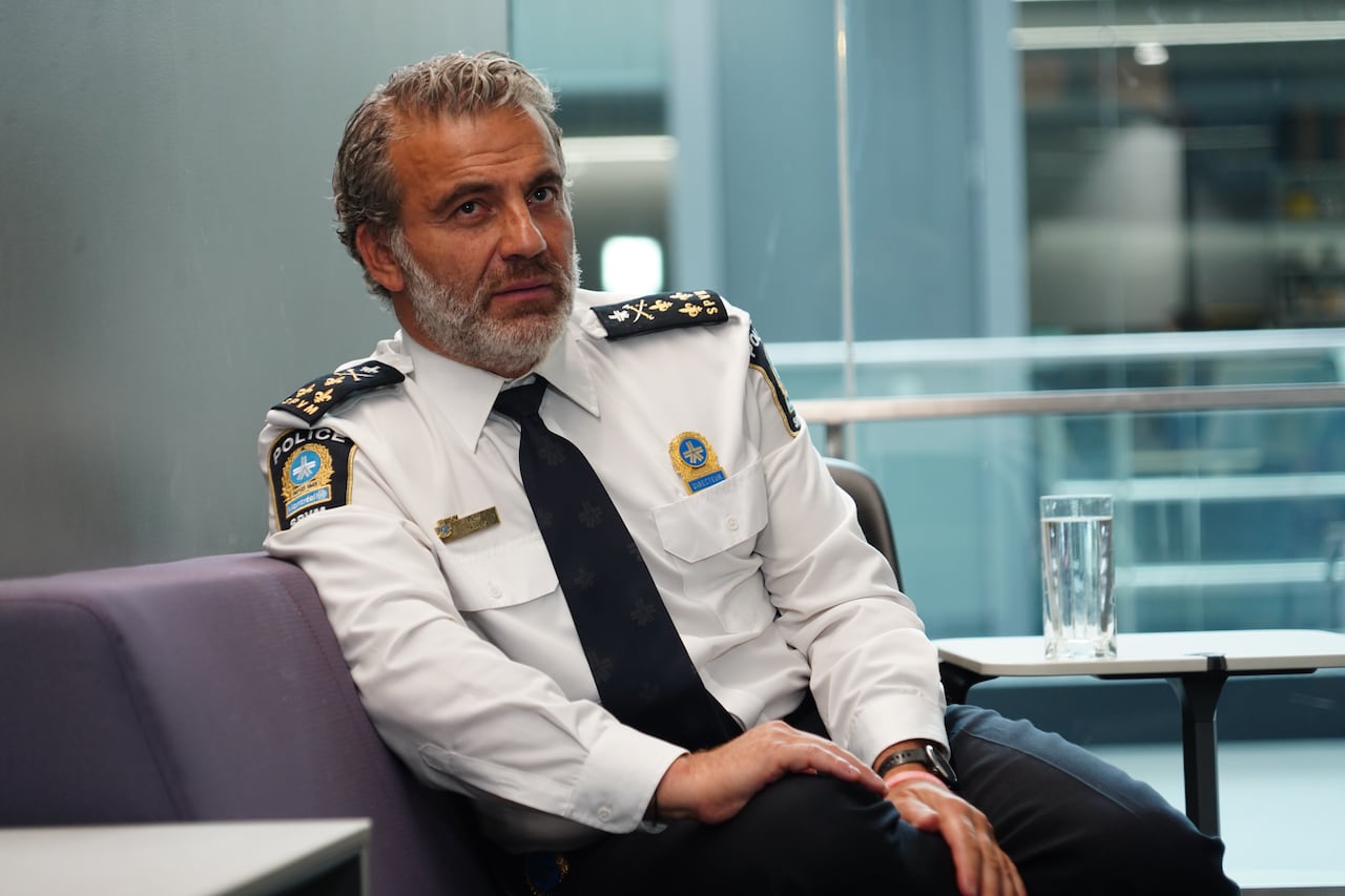 Fady Dagher in his white police uniform at the CBC studio
