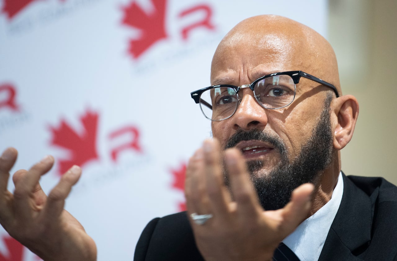 Alain Babineau, Director of Racial profiling for the Red Coalition speaks during a news conference