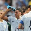 Uruguay's Agustin Canobbio cools off during a hydration break in a World Cup soccer match against Saudi Arabia in Miami Gardens, Fla., on June 15, 2026.
