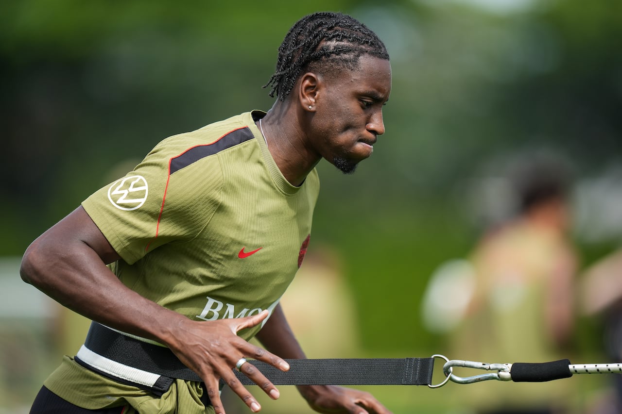 A soccer player trains.