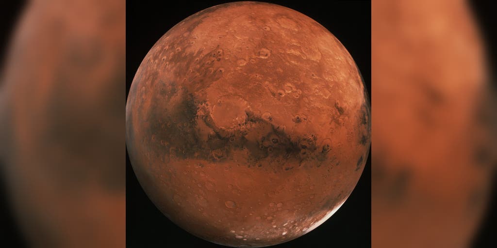 Man vs machine: Who will walk on Mars first?