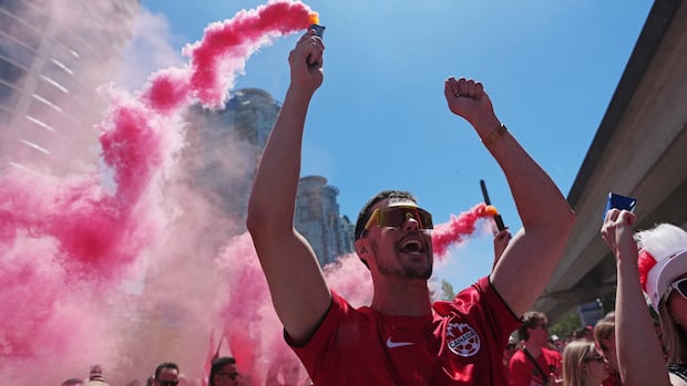 World Cup fans paint the town red in Vancouver celebrating team's 'monumental win'