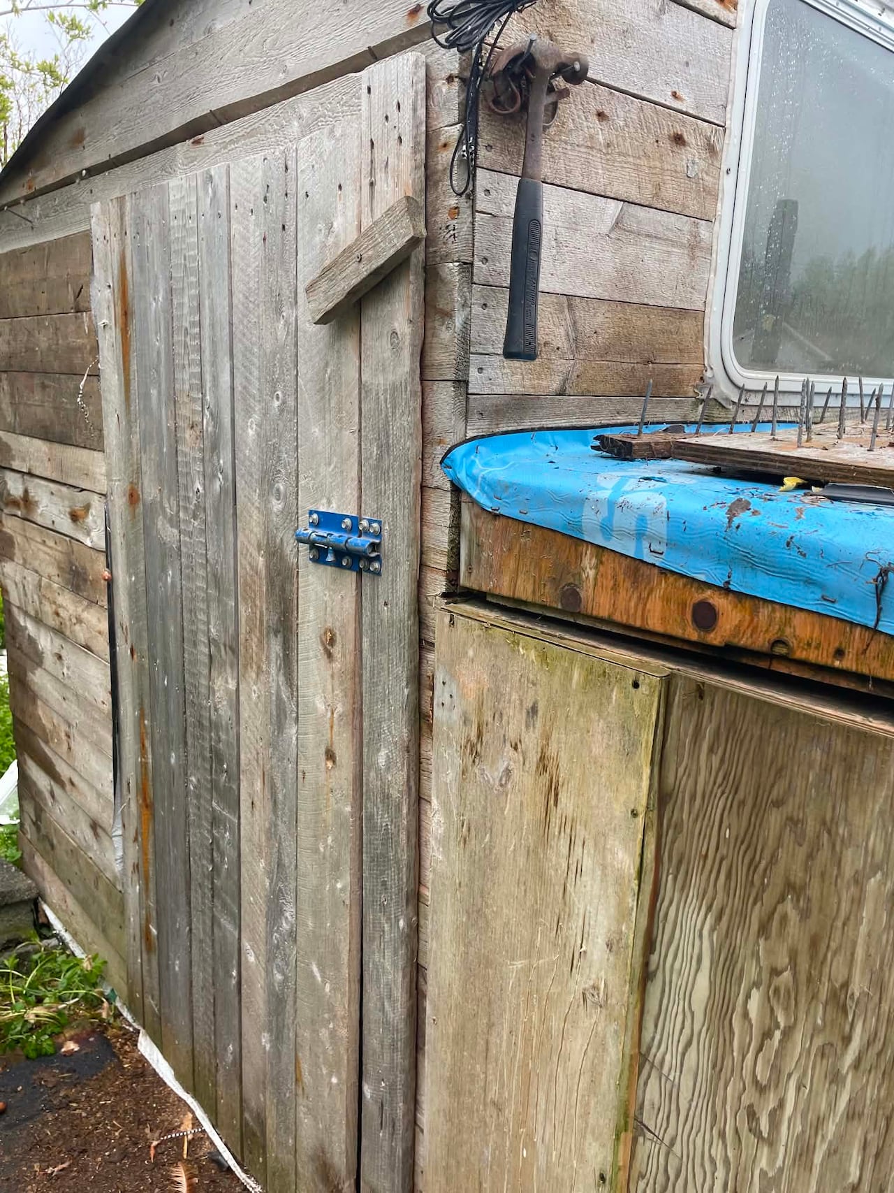 A wooden structure with a door.