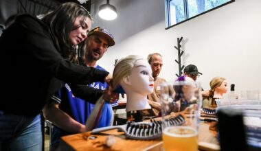 Winnipeg dads learn how to braid their daughters' hair as they bond over beers