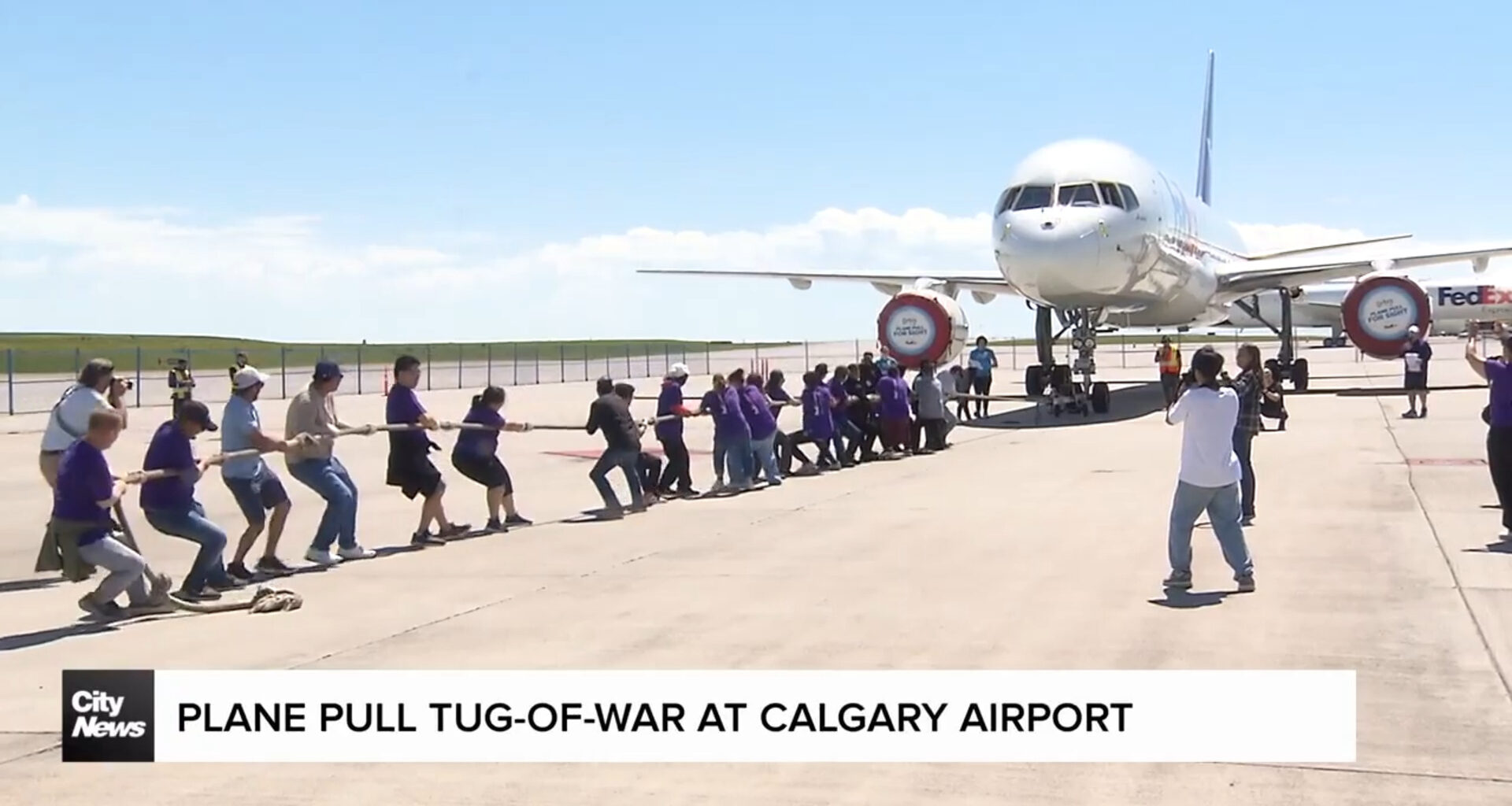Plane pull tug-of-war gets underway at Calgary Airport