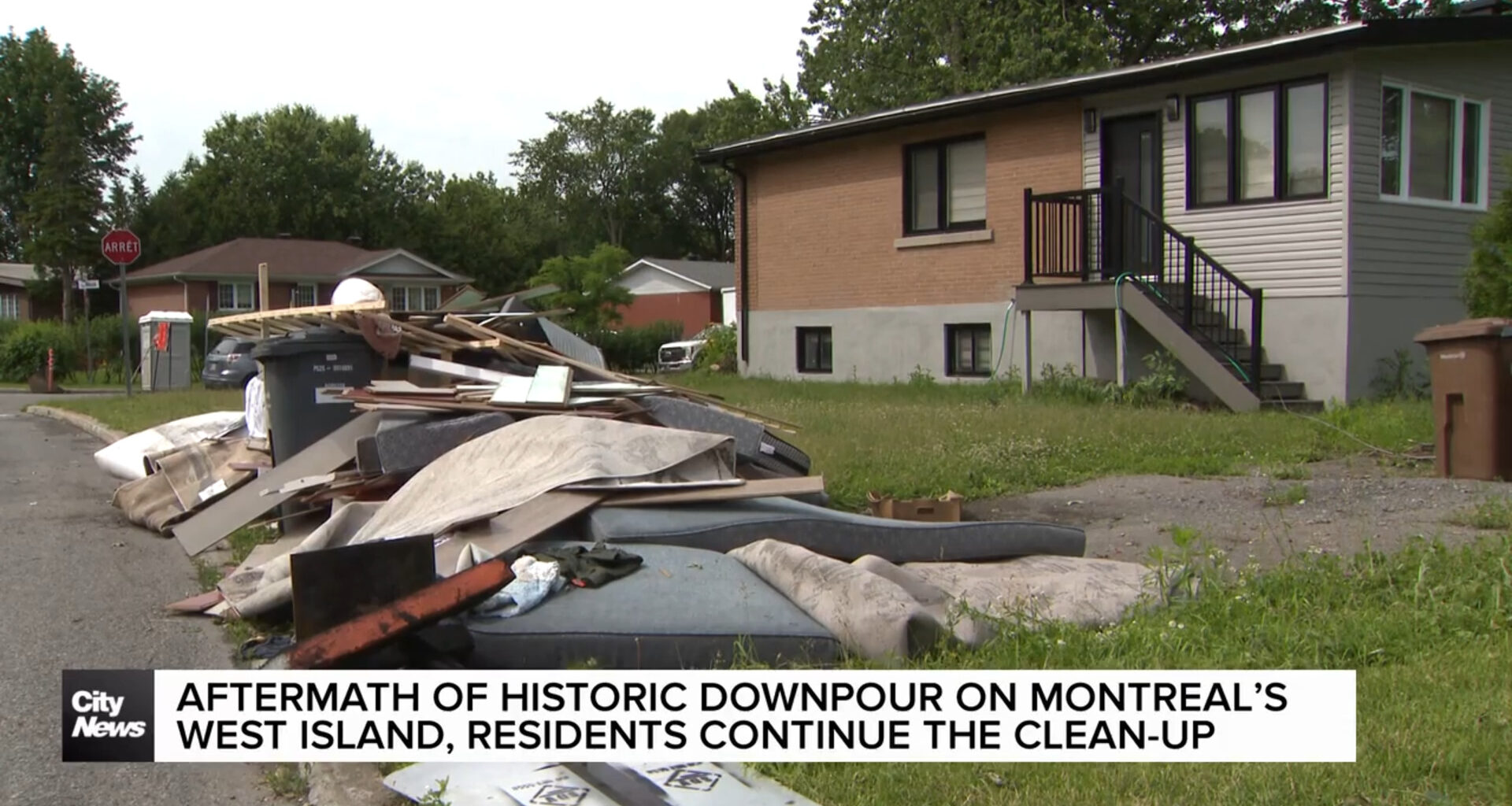 Residents of Montreal’s West Island cleaning up after flooding