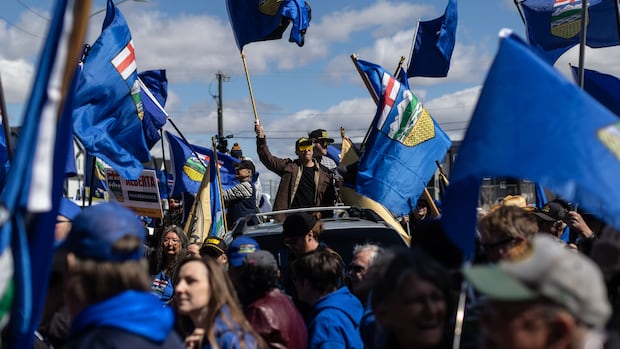 Flags become symbols for two sides in Alberta’s separation debate