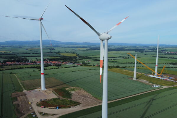 Wind turbines stand in various stages of completion near Deersheim, Germany, June 10, 2026. (AP Photo/Matthias Schrader, File)