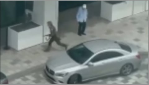 A person holding a gun.