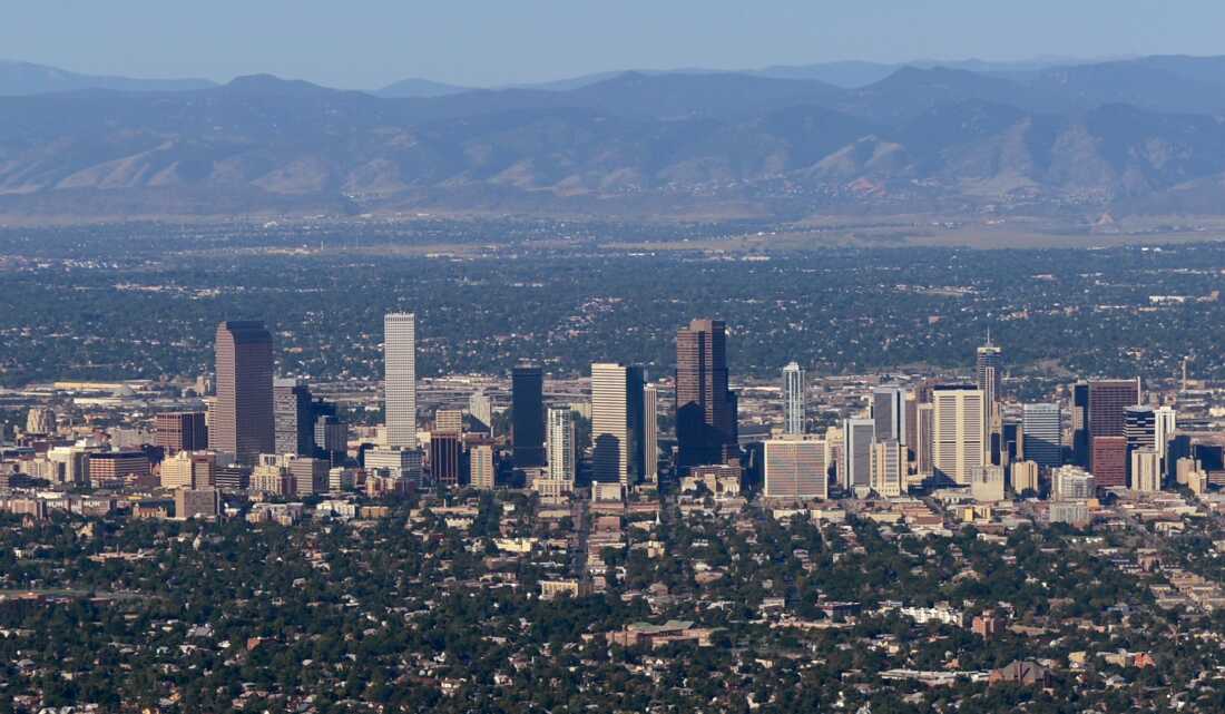 The downtown Denver skyline is seen from the air.