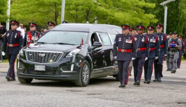 Family, Toronto police officers honour Const. Marc Pinizzoto, who was killed during investigation