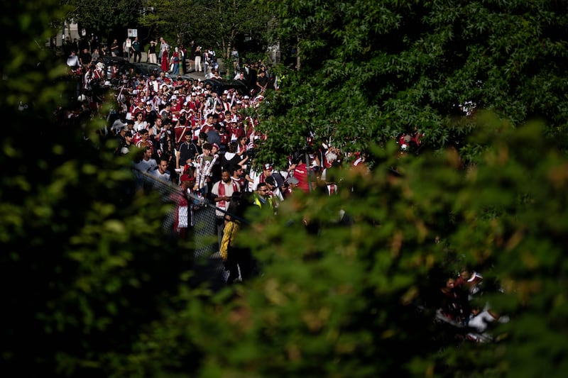 Qatar fans march