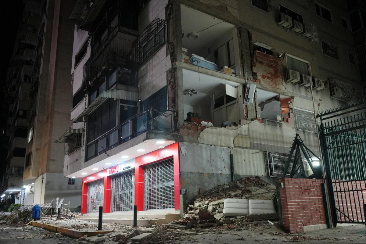 The quakes damaged walls, exposing the interiors of buildings 