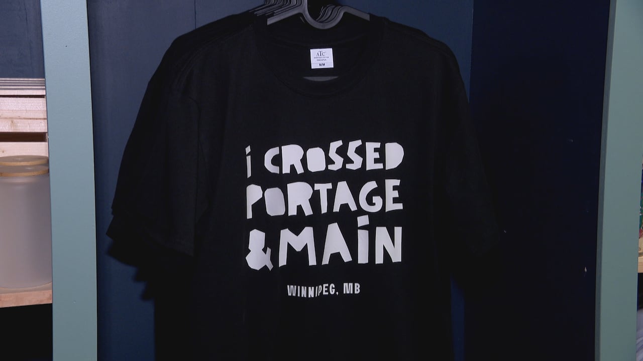 A black T-shirt with white lettering