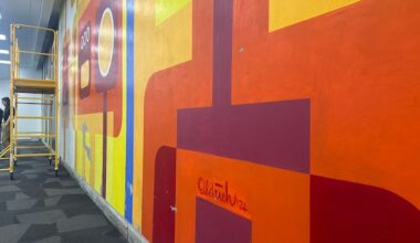 Revival underway of 2 downtown Calgary murals after more than half a century