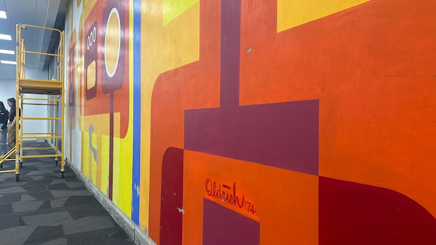 Revival underway of 2 downtown Calgary murals after more than half a century