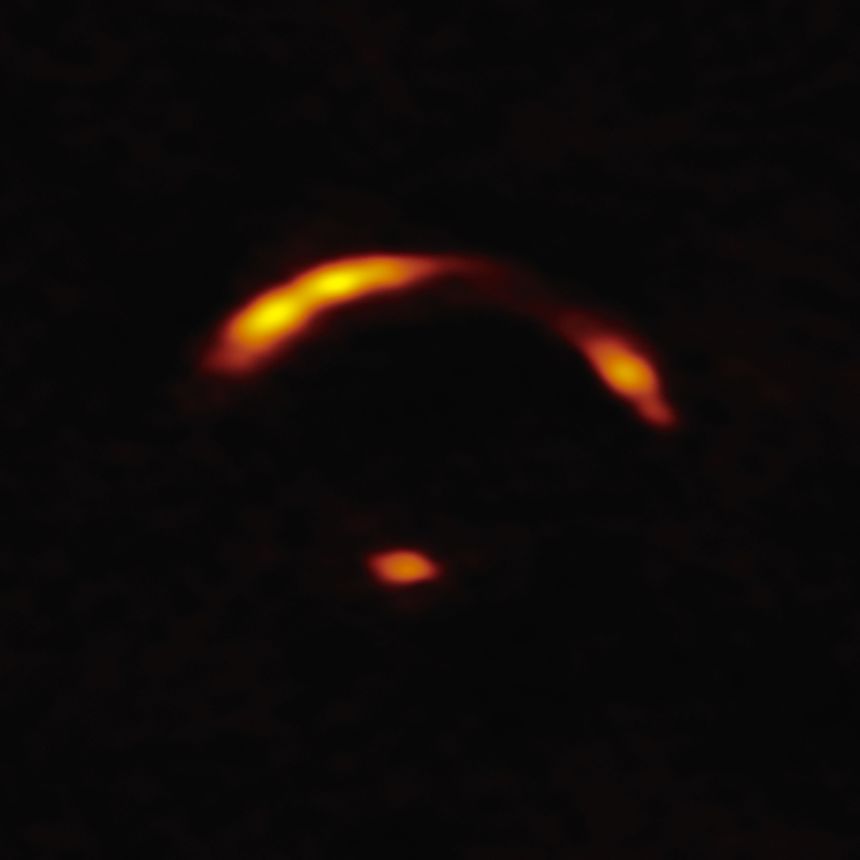 These yellow arcs are all that astronomers can see of the Shadow Blaster galaxy.