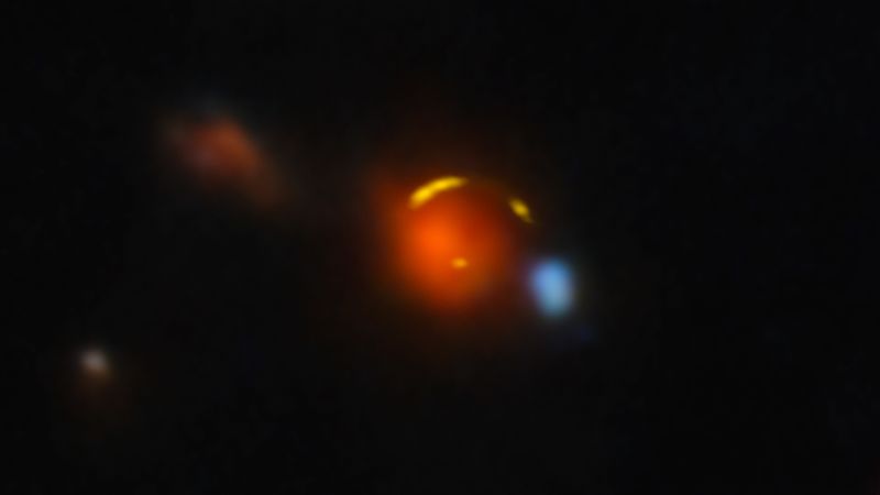 Distant galaxy could produce universe’s most mysterious particles