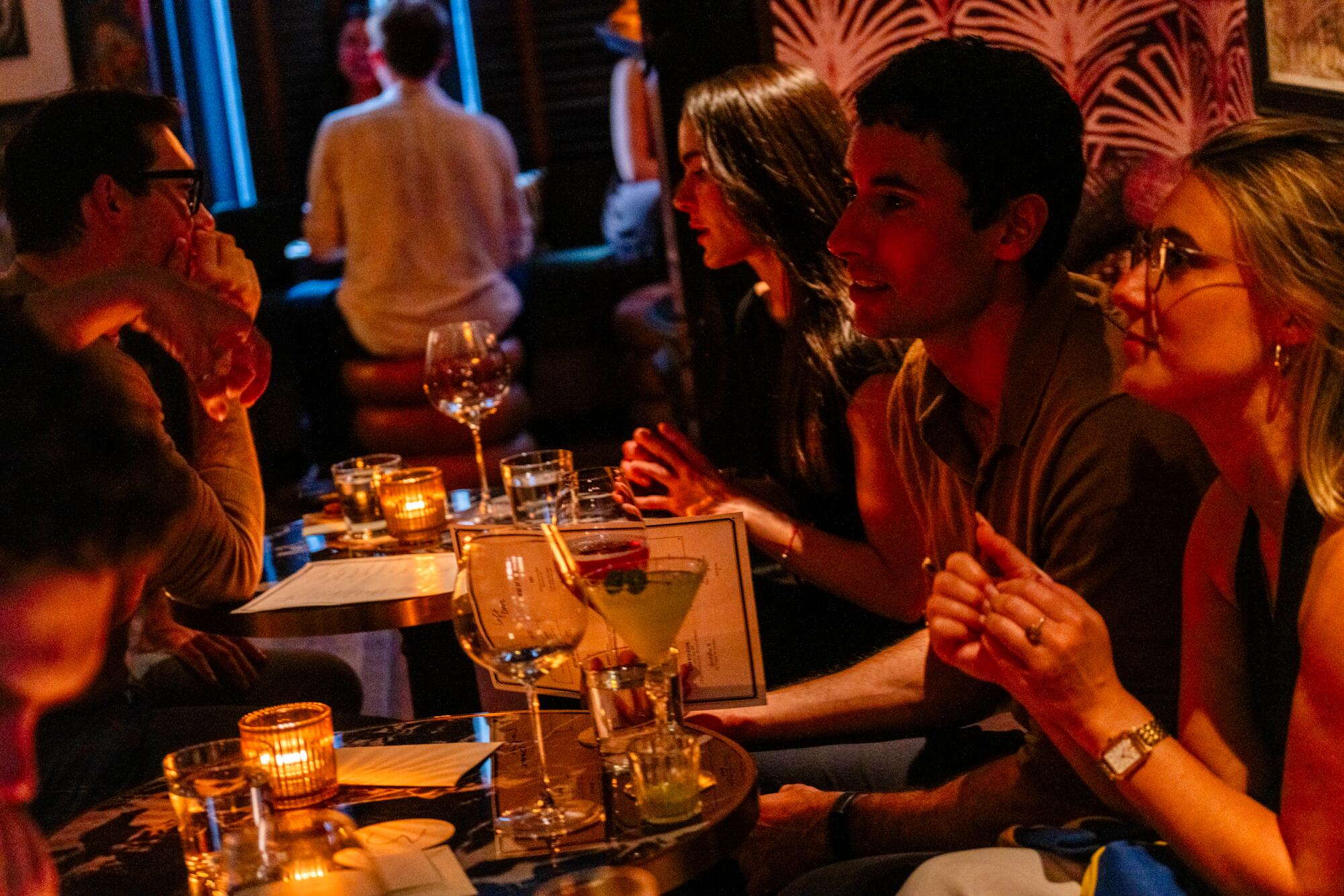 Singles attend a dating event hosted by startup Known in San Francisco.