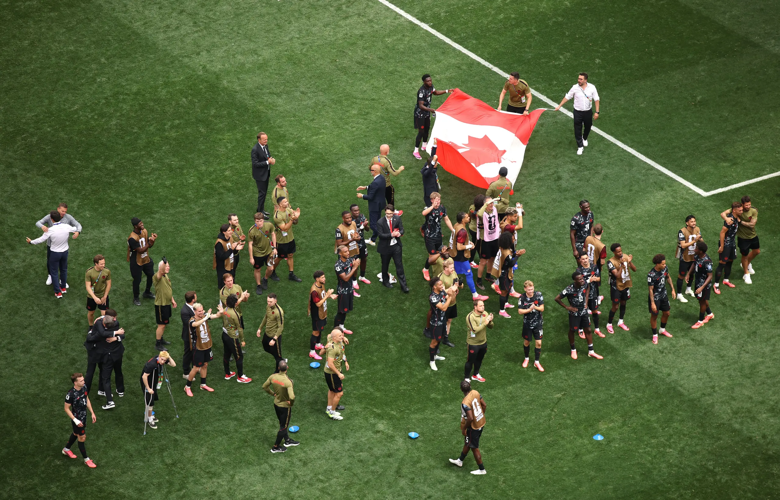 Players of Canada celebrate towards the fans after the team's victory