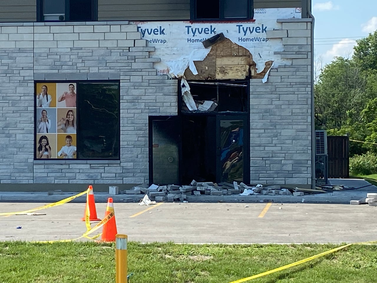 The aftermath of a business fire in Iroquois, Ont., on June 29, 2026, that police believe is connected to a murder-suicide.