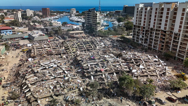 Buildings are collapsed and damaged along the coast in Caraballeda, La Guaira state, Venezuela, Sunday, June 28, 2026, following earthquakes. (Miguel Medina, Pool photo via AP)