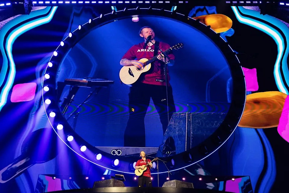 Ed Sheeran donned an Arizona Cardinals jersey for his encore at opening night of the North American leg of his LOOP Tour, June 13, 2026 at State Farm Stadium in Glendale, Arizona.