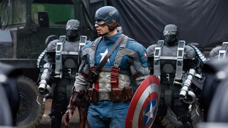 Chris Evans as Captain America surrounded by Hydra soldiers in Captain America: The First Avenger.