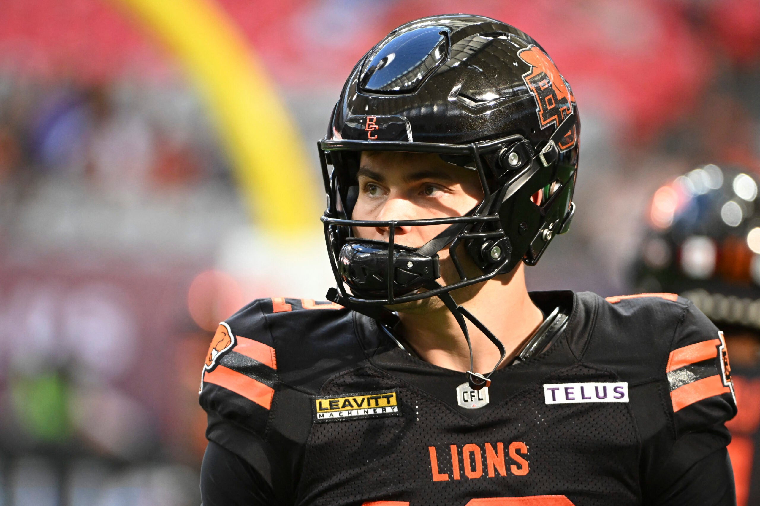 Jun 7, 2025; Vancouver, British Columbia, Canada; BC Lions quarterback Nathan Rourke (12) warms up prior to the first half against the Edmonton Elks at BC Place Stadium.