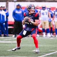 Nov 1, 2025; Montreal, Quebec, Canada; Montreal Alouettes quarterback Davis Alexander (10) gets ready to pass the ball against the Winnipeg Blue Bombers during the first quarter at Percival-Molson stadium.