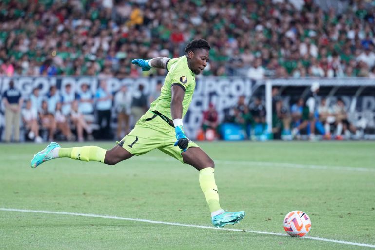 Jun 29, 2023; Glendale, Arizona, USA; (Editors Notes: Caption Correction) Haiti goalkeeper Alexandre Pierre (1) takes a goal kick against Mexico during the second half of a Gold Cup game at State Farm Stadium. Mandatory Credit: Joe Camporeale-Imagn Images