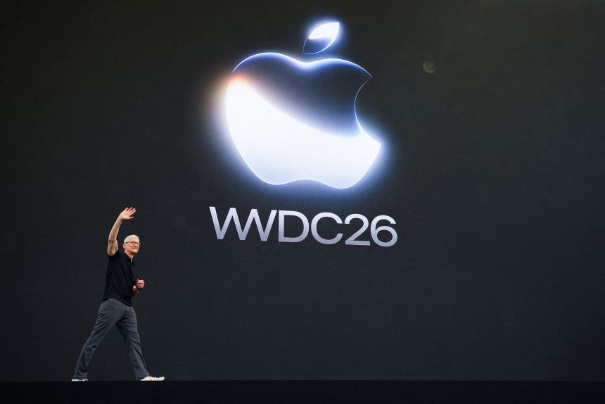 Apple CEO Tim Cook waves on stage during Apple's annual Worldwide Developers Conference in Cupertino, California, on June 8, 2026.