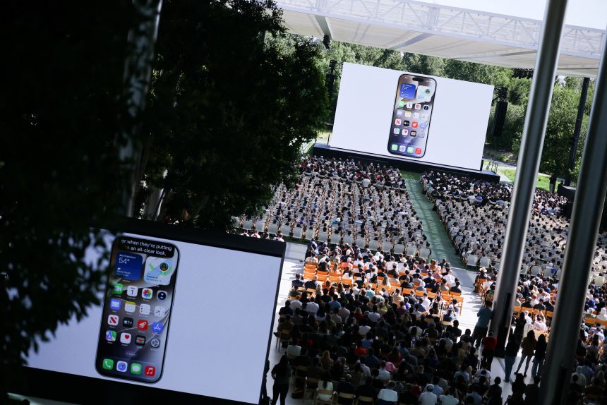 Attendees watch a presentation during Apple's annual Worldwide Developers Conference in Cupertino, California, on June 8.