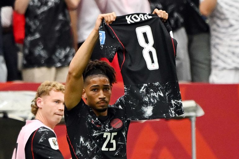 Soccer Football - FIFA World Cup 2026 - Group B - Canada v Qatar - BC Place, Vancouver, Canada - June 18, 2026 Canada's Nathan Saliba holds up the shirt of injured player Ismael Kone as he celebrates scoring their fourth goal IMAGN IMAGES via Reuters/Anne-Marie Sorvin