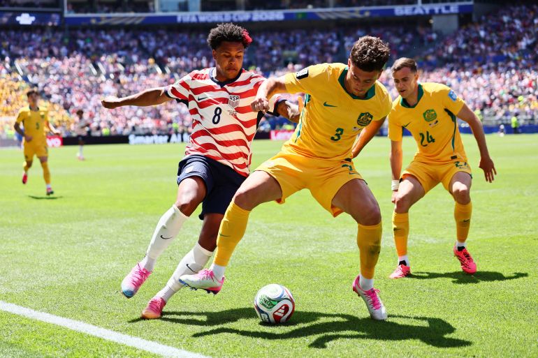 Soccer Football - FIFA World Cup 2026 - Group D - United States v Australia - Seattle Stadium, Seattle, Washington, U.S. - June 19, 2026 Weston McKennie of the U.S. in action with Australia's Alessandro Circati IMAGN IMAGES via Reuters/Blake Dahlin