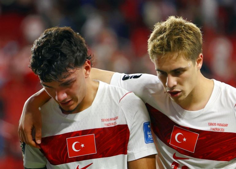 Soccer Football - FIFA World Cup 2026 - Group D - Turkey v Paraguay - San Francisco Bay Area Stadium, Santa Clara, California, U.S. - June 19, 2026 Turkey's Can Uzun and Kenan Yildiz look dejected after the match REUTERS/Luisa Gonzalez