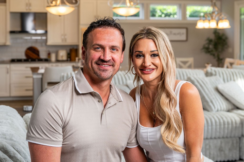Ryan Lochte and Molly Gillihan pose for a photo in their Gainesville, Florida home.