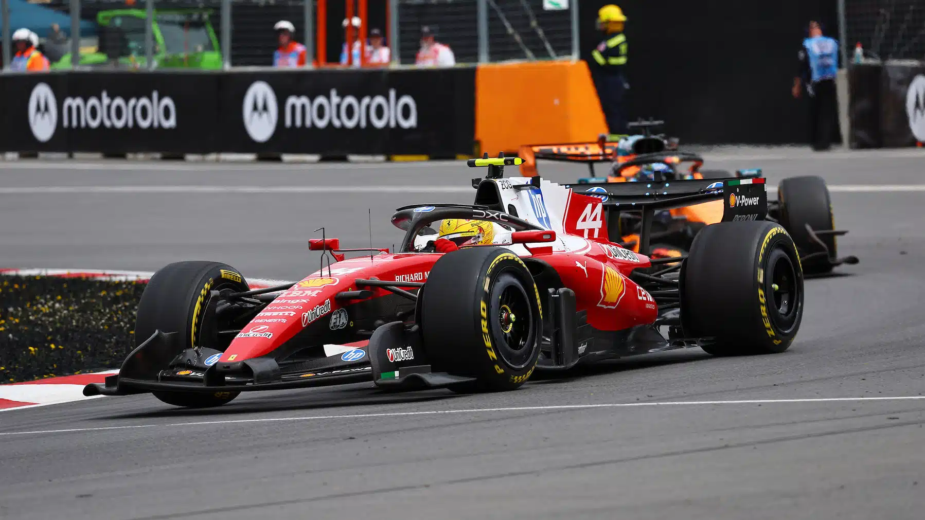 Lewis Hamilton (Ferrari) leads Oscar Piastri (McLaren-Mercedes) during the sprint race before the 2026 Canadian Grand Prix