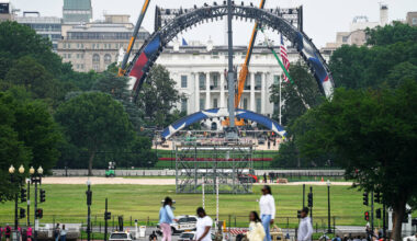 Construction continues at the White House to build a temporary structure for next month's ...