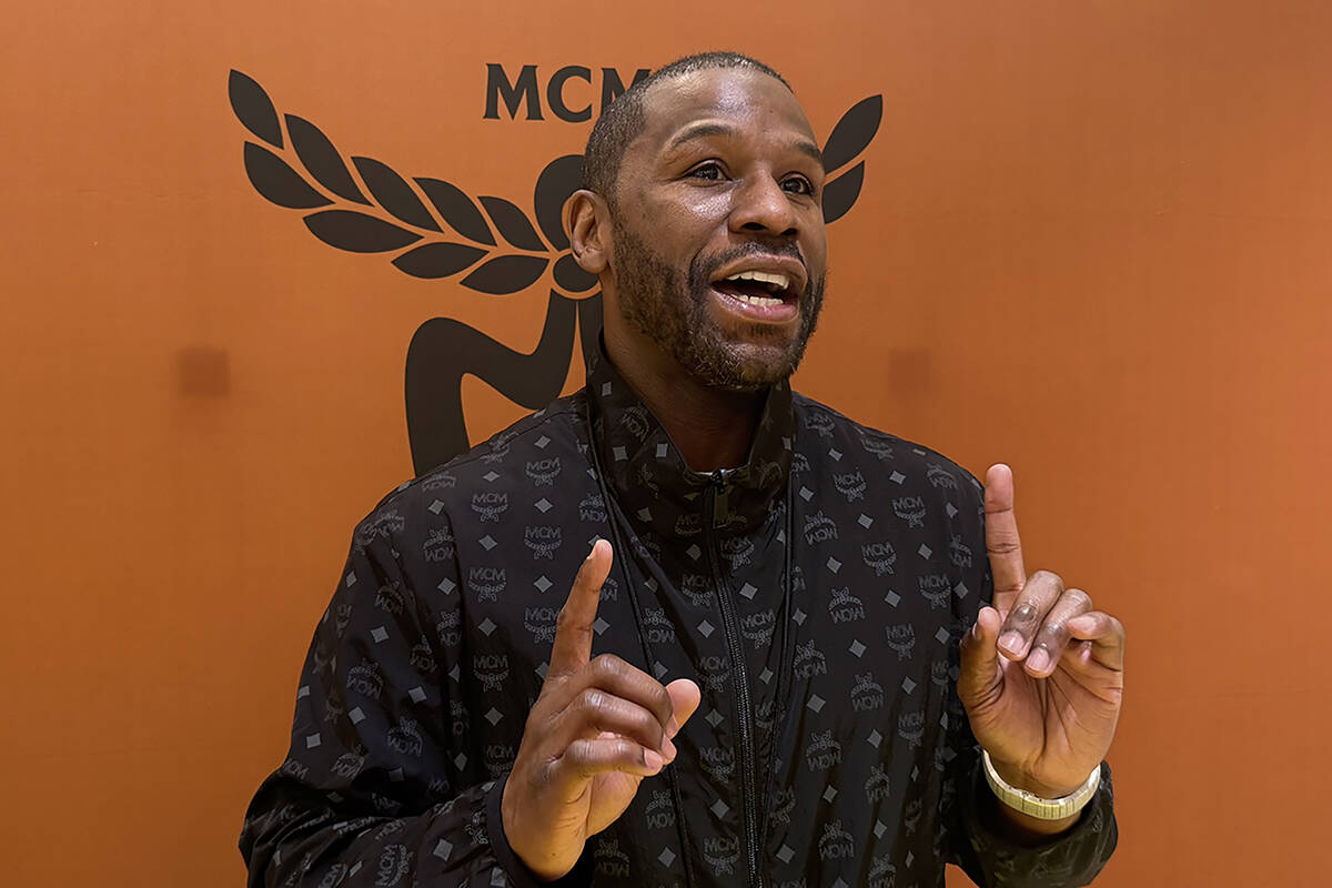 Floyd Mayweather speaks to media on Saturday, March 28, 2026, at the MCM retail store inside th ...