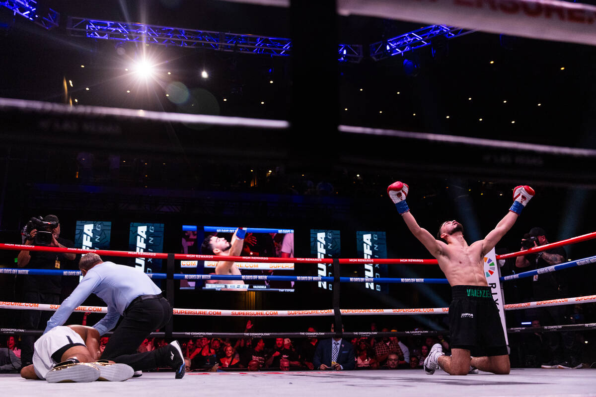 Jose Valenzuela celebrates after knocking out Edwin De Los Santos in the second round during th ...
