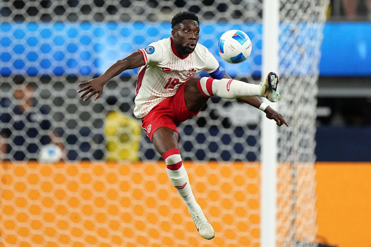 Alphonso Davies of Canada controls the ball during a match against Mexico on March 20, 2025 in Inglewood, Calif.