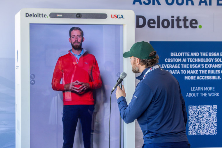 A fan asks a question of an AI-generated avatar based on the USGA's new Rules AI service at the U.S. Open in Southampton, N.Y.