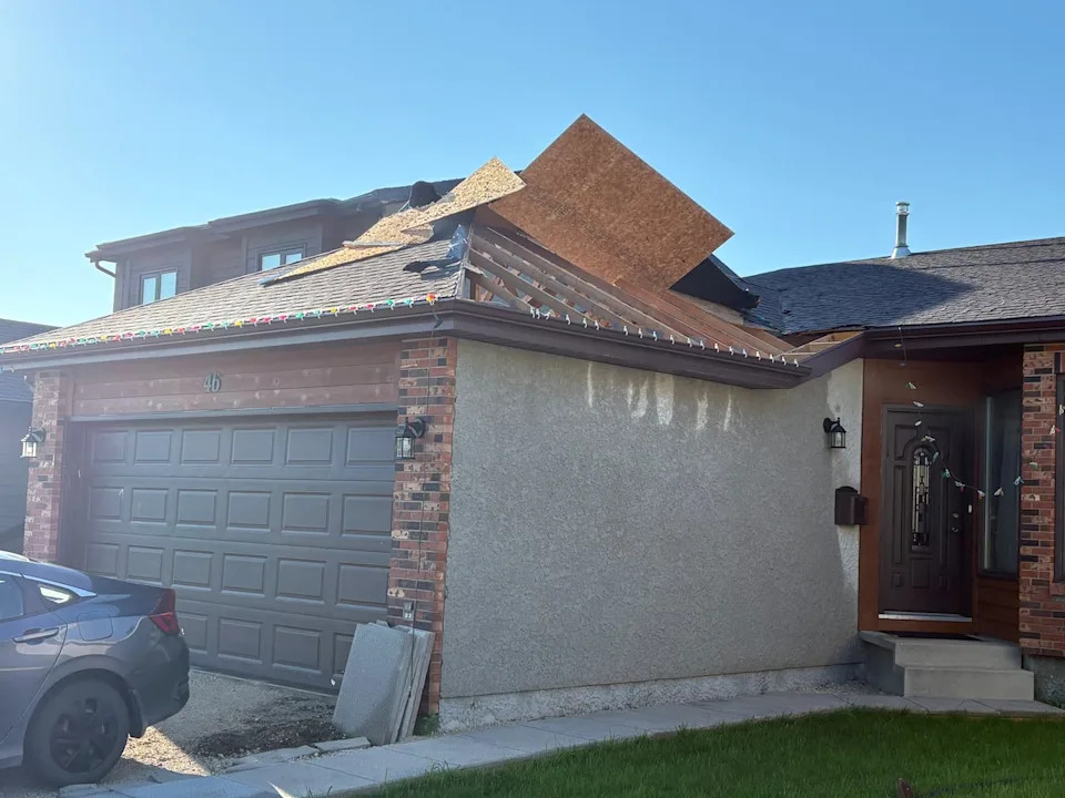 A roof is torn off a garage on Tolcross Gate exposing the rafters and trusses. Pic taken on June 30, 2026.